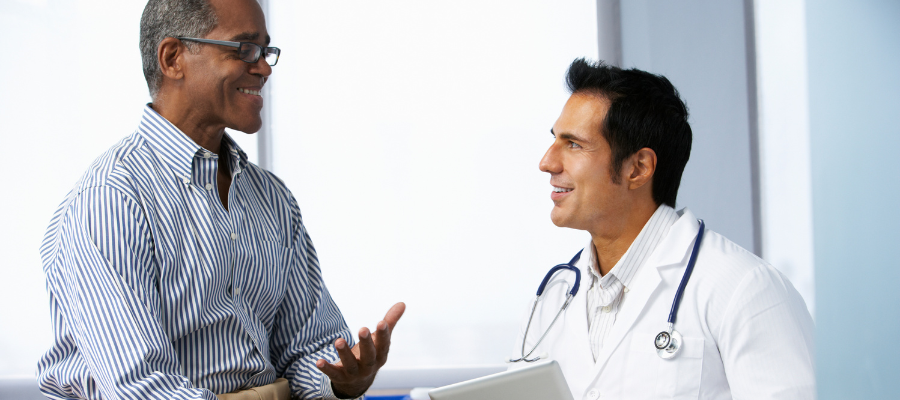 Doctor consults senior patiant in clinic